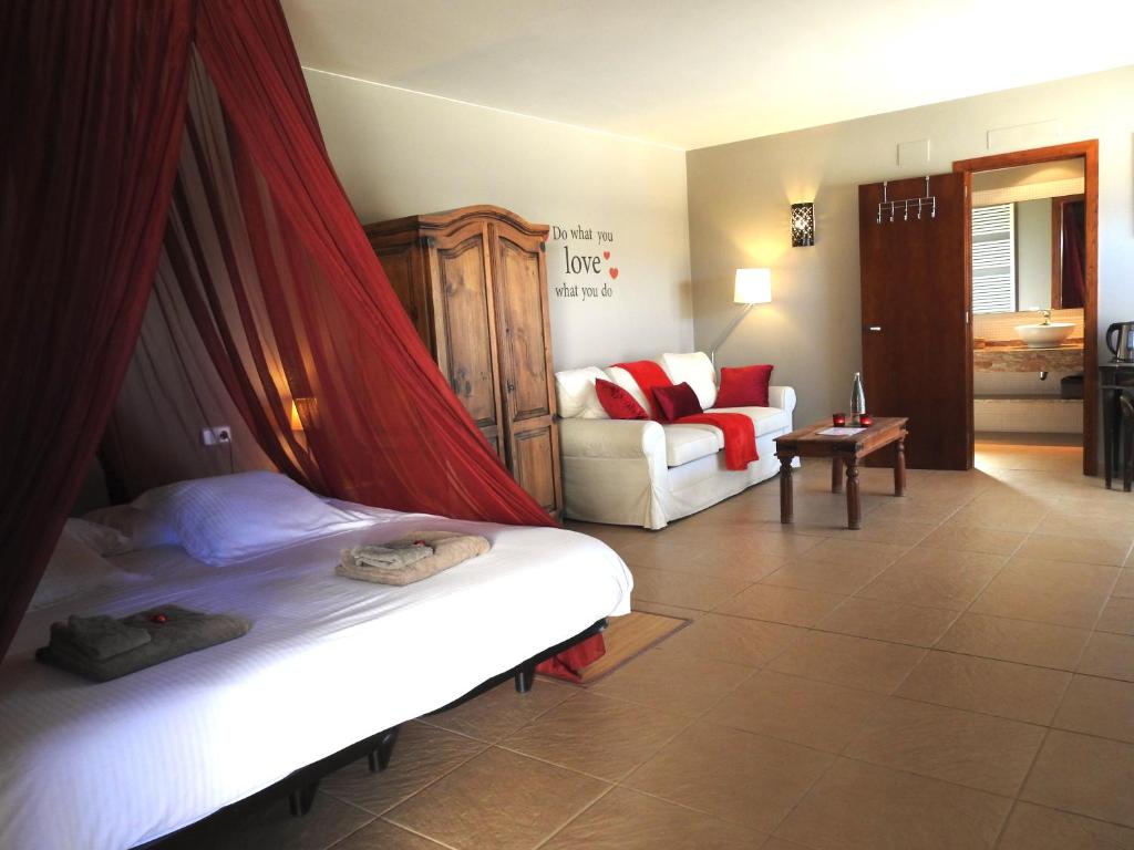 Postel nebo postele na pokoji v ubytování B&B El Ranxo