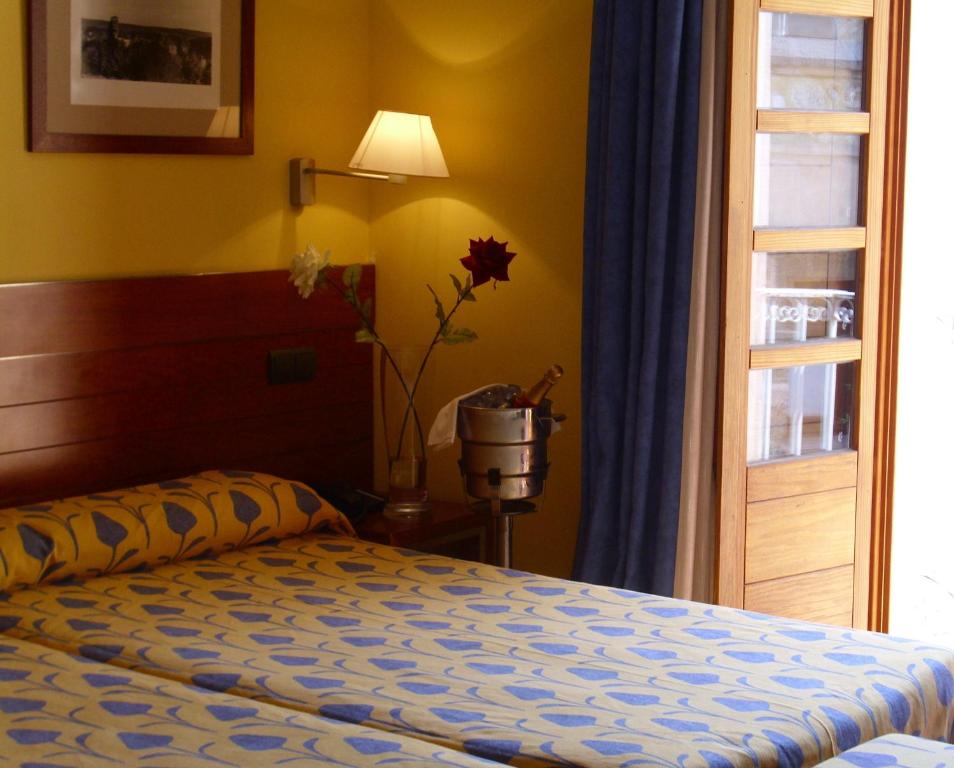 Postel nebo postele na pokoji v ubytování Hotel Rural Vado del Duratón
