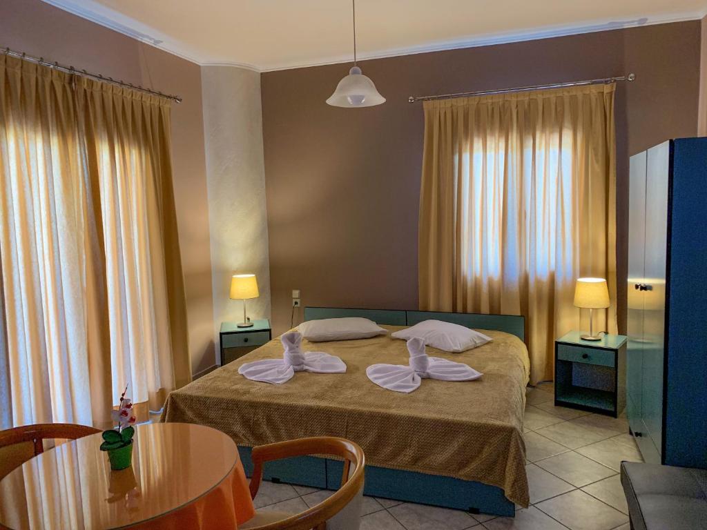 A bed or beds in a room at Acheron Springs-Markou Ilias