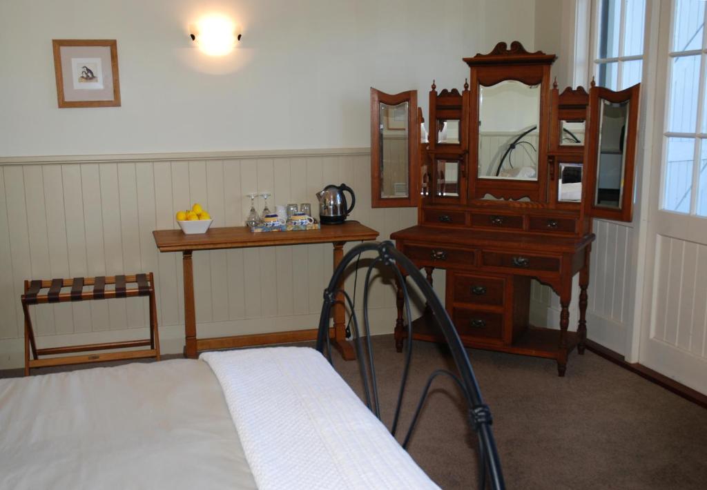 Postel nebo postele na pokoji v ubytování Braestone Lodge