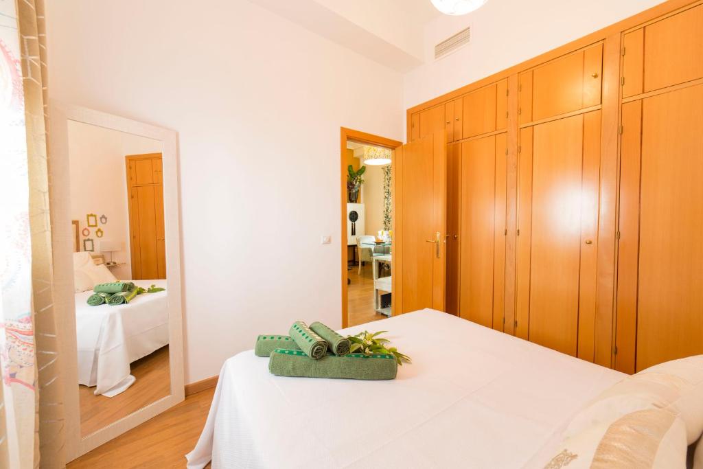 Posteľ alebo postele v izbe v ubytovaní APARTAMENTO CASA NARANJO