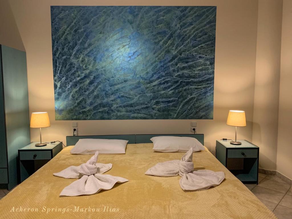 A bed or beds in a room at Acheron Springs-Markou Ilias
