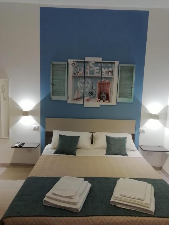 Posteľ alebo postele v izbe v ubytovaní Flamingo Rooms