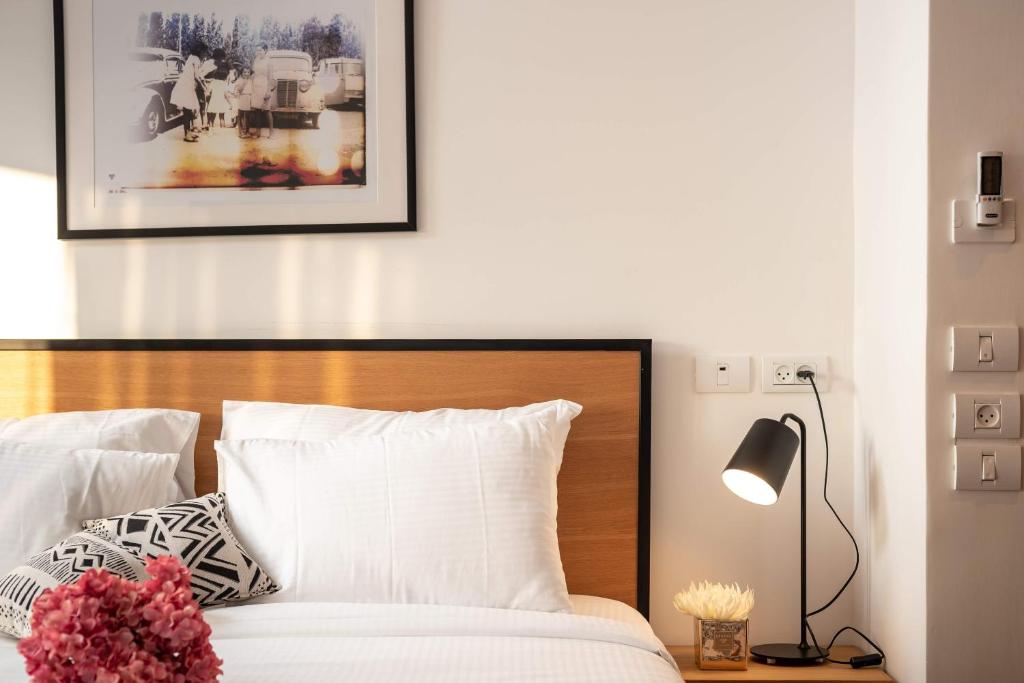 Postel nebo postele na pokoji v ubytování Biazi Hotel