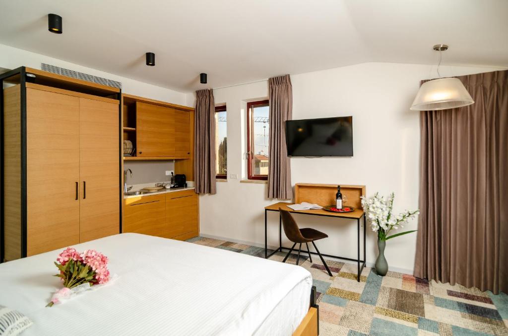 Kuchyň nebo kuchyňský kout v ubytování Biazi Hotel