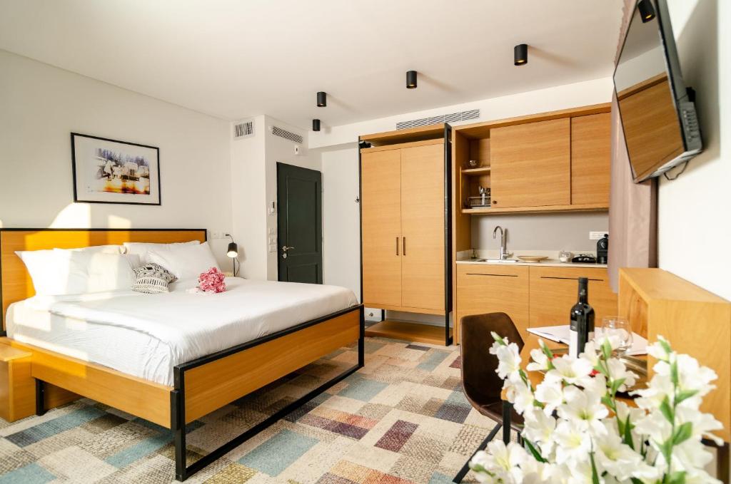 Postel nebo postele na pokoji v ubytování Biazi Hotel