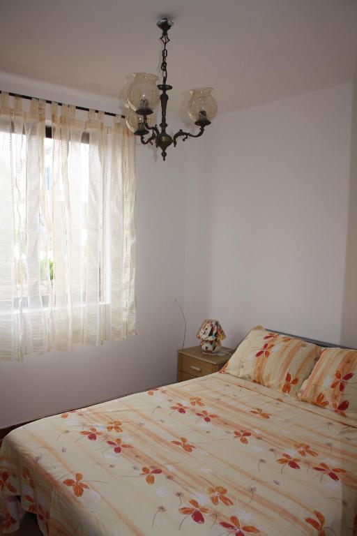 Voodi või voodid majutusasutuse Apartman Slavko toas