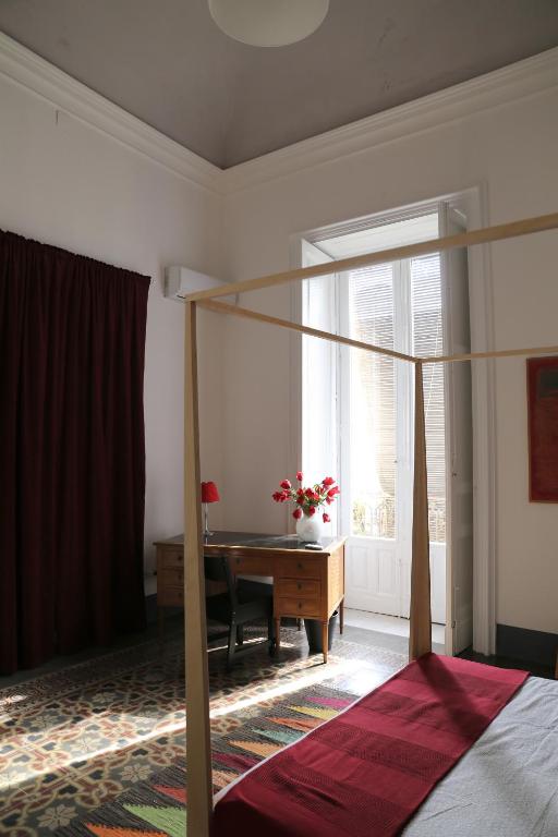 Łóżko lub łóżka w pokoju w obiekcie Trìcora Sicilian B&B