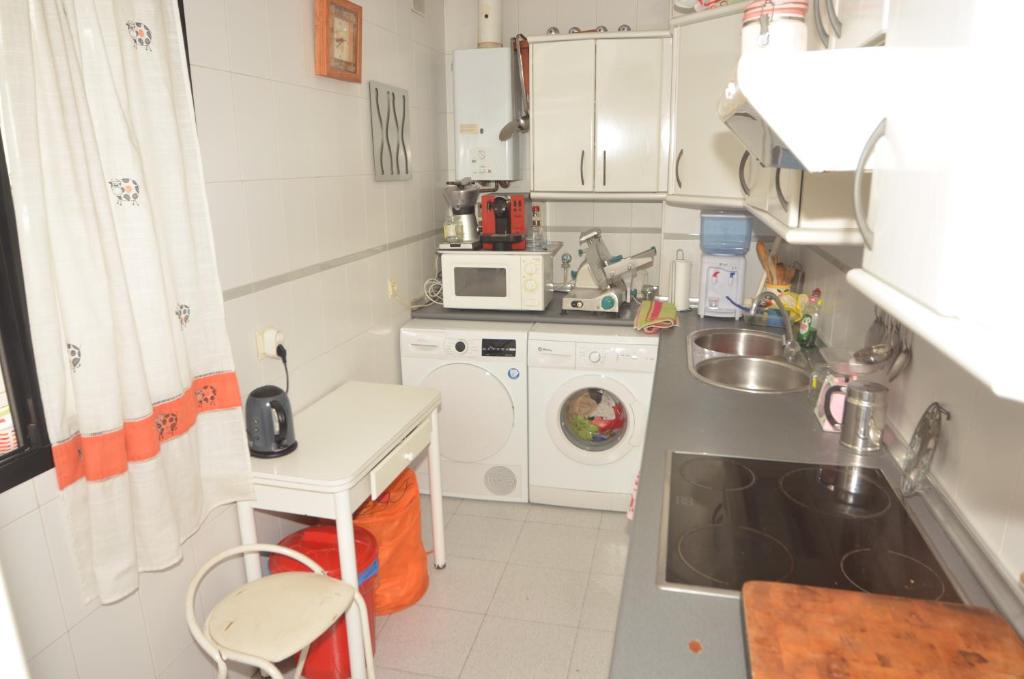 Kuchyňa alebo kuchynka v ubytovaní habitacion centro historico malaga