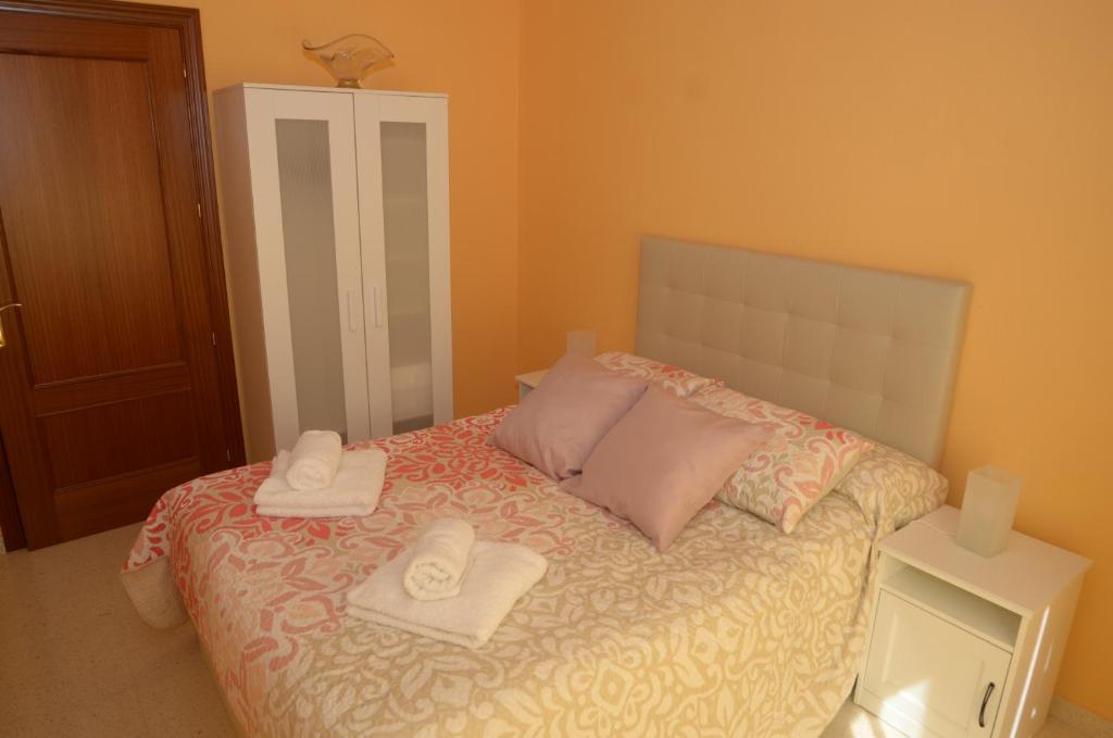 Posteľ alebo postele v izbe v ubytovaní habitacion centro historico malaga