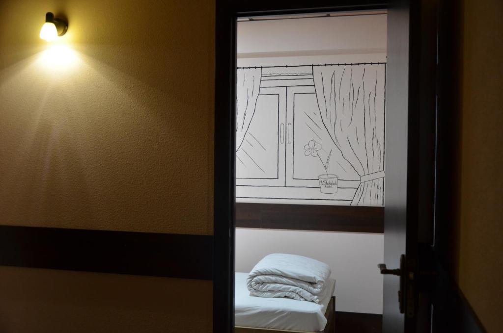 Postel nebo postele na pokoji v ubytování Hostel VShokoladi
