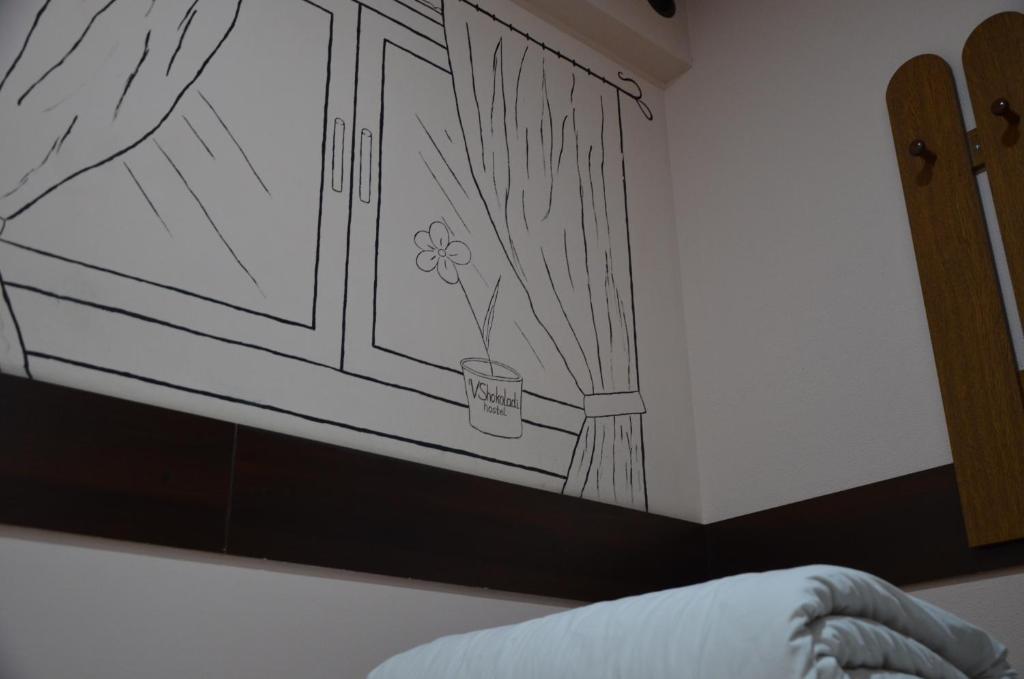 Postel nebo postele na pokoji v ubytování Hostel VShokoladi