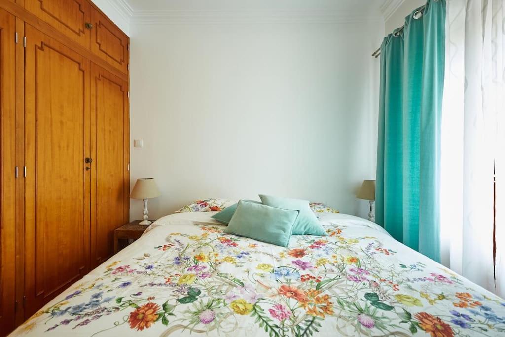 Postel nebo postele na pokoji v ubytování Beija-Flor House