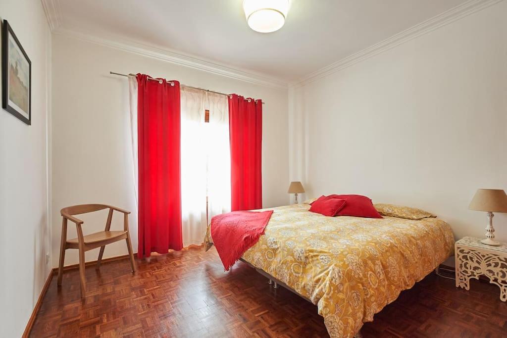 Postel nebo postele na pokoji v ubytování Beija-Flor House