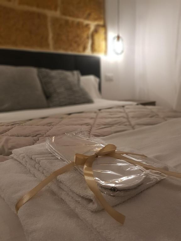 Postel nebo postele na pokoji v ubytování Gocce di Girgenti - comfort suites