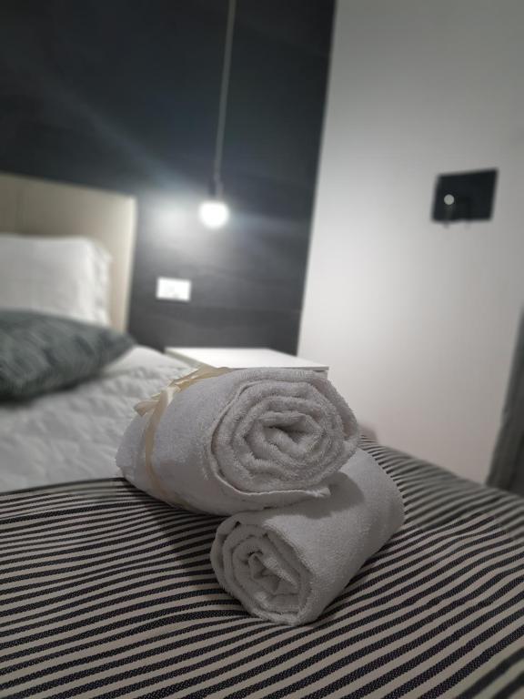 Postel nebo postele na pokoji v ubytování Gocce di Girgenti - comfort suites