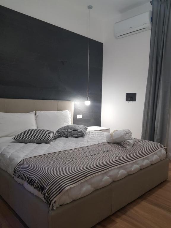 Postel nebo postele na pokoji v ubytování Gocce di Girgenti - comfort suites