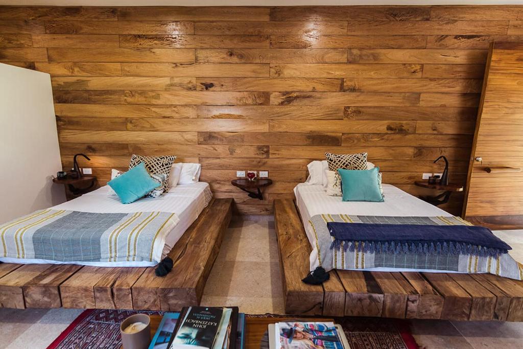 Postel nebo postele na pokoji v ubytování Samora Luxury Resort