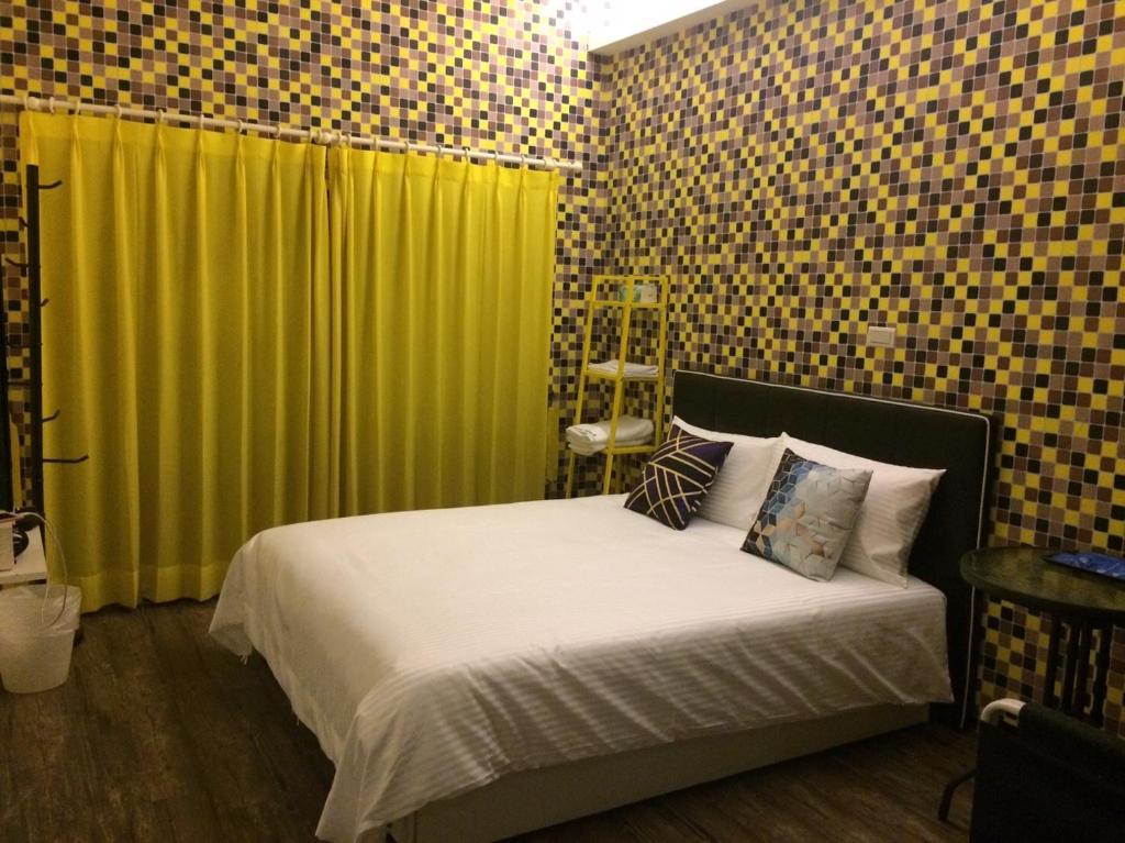 Postel nebo postele na pokoji v ubytování Traveler Station R15