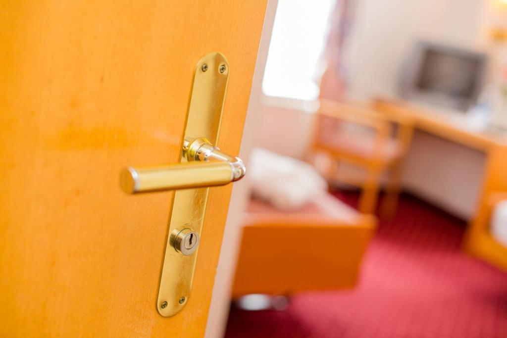 TV a/nebo společenská místnost v ubytování Hotel Heilquelle-Leukerbad-Therme
