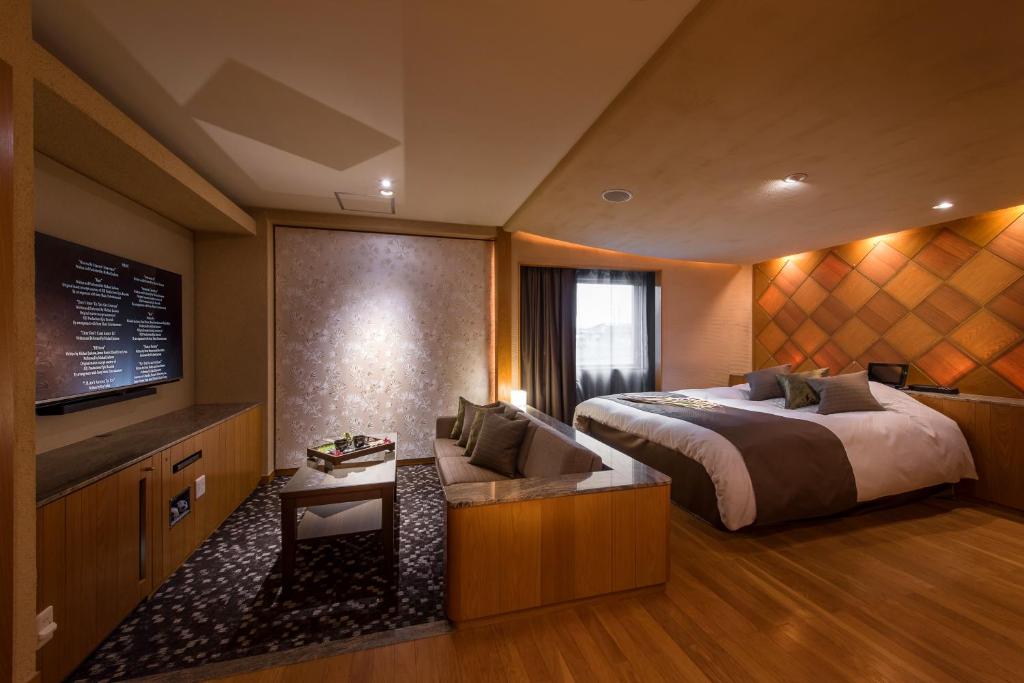 Postel nebo postele na pokoji v ubytování Hotel C. Chiba Shiroi