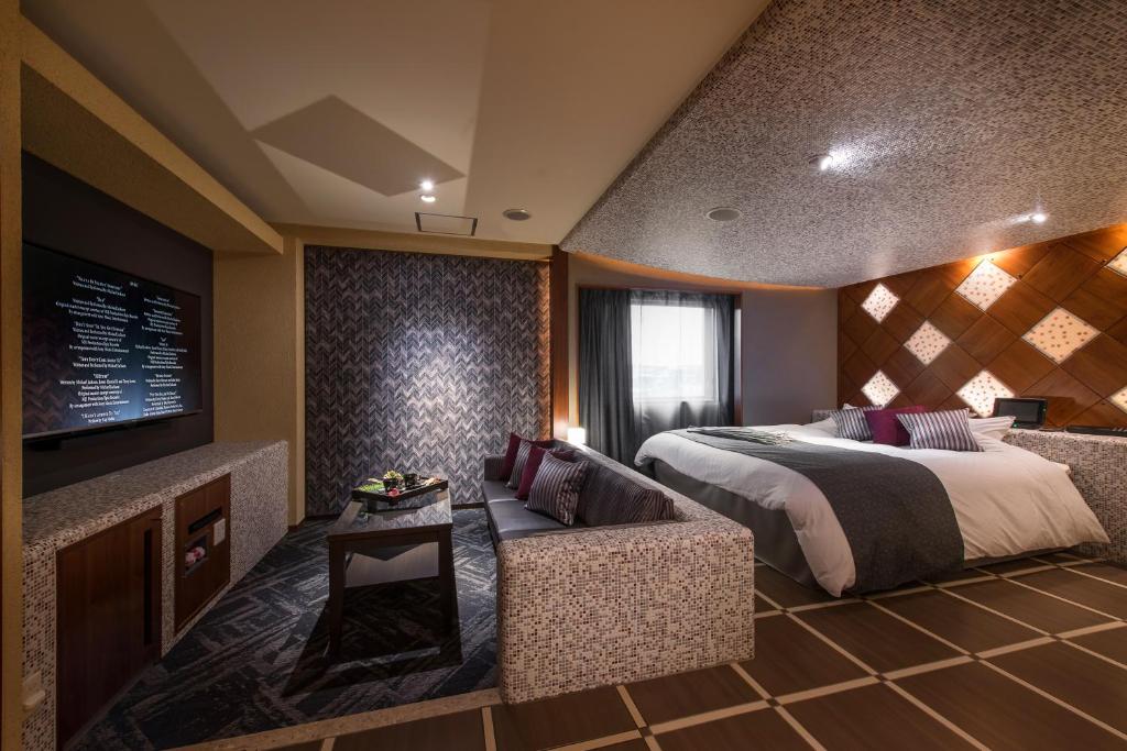 Postel nebo postele na pokoji v ubytování Hotel C. Chiba Shiroi