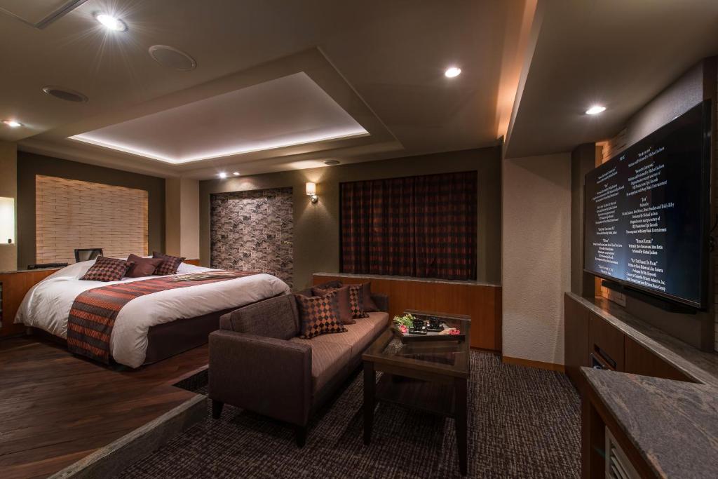 Postel nebo postele na pokoji v ubytování Hotel C. Chiba Shiroi