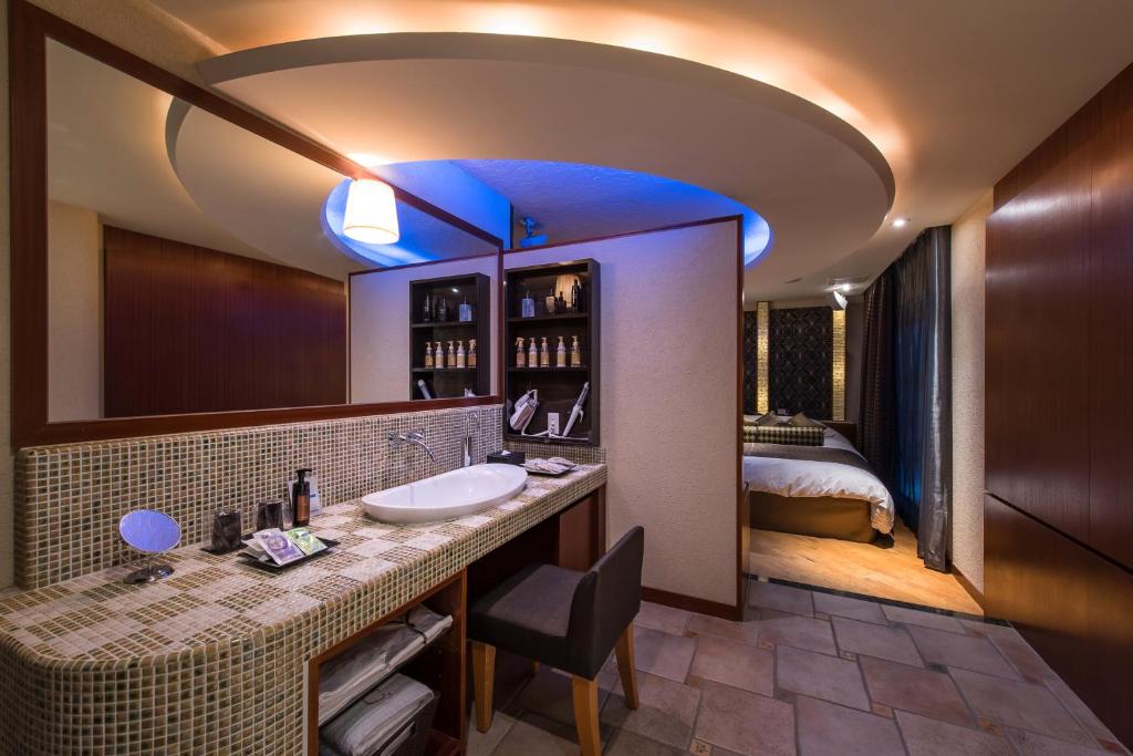 Postel nebo postele na pokoji v ubytování Hotel C. Chiba Shiroi