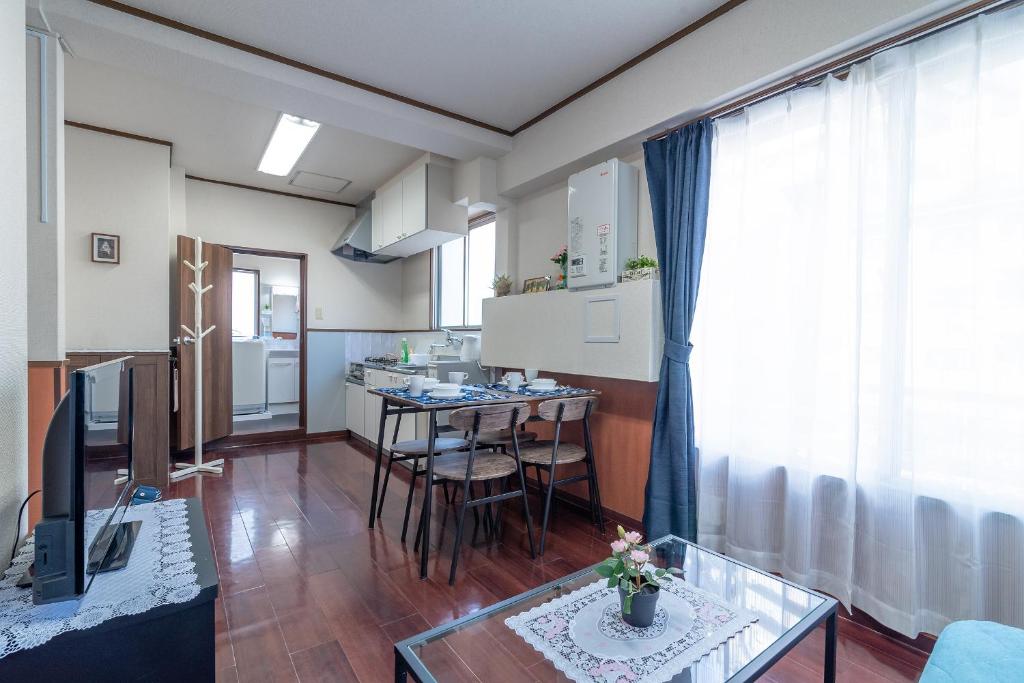 Kuchyň nebo kuchyňský kout v ubytování Uhome Iriya Apartment