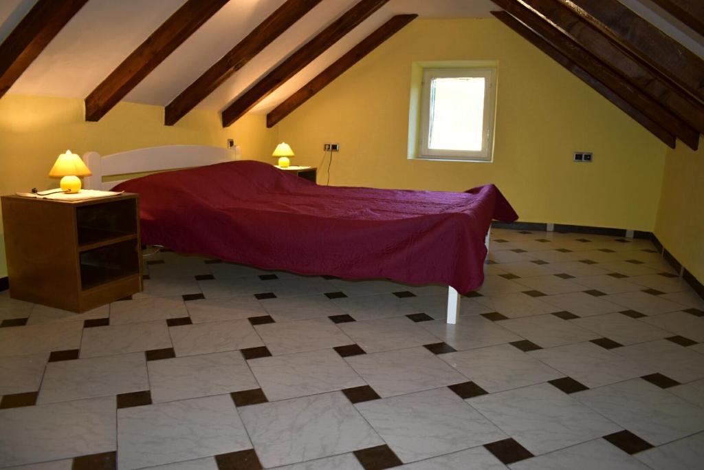 Łóżko lub łóżka w pokoju w obiekcie Apartments Carpe Diem