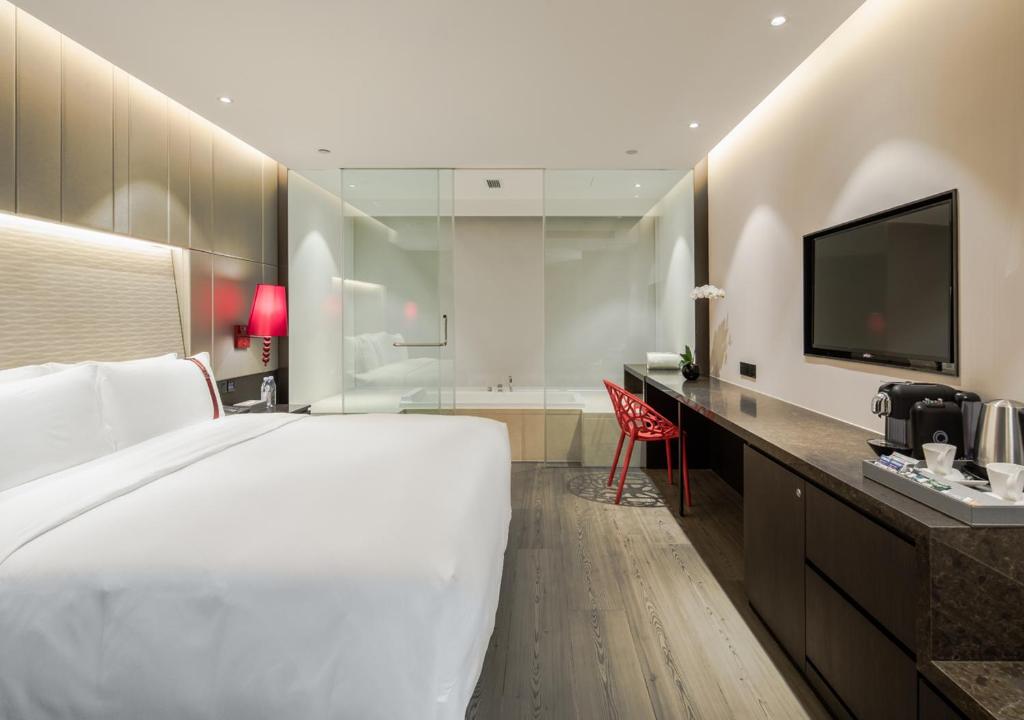 Postel nebo postele na pokoji v ubytování Rhombus Park Aura Chengdu Hotel