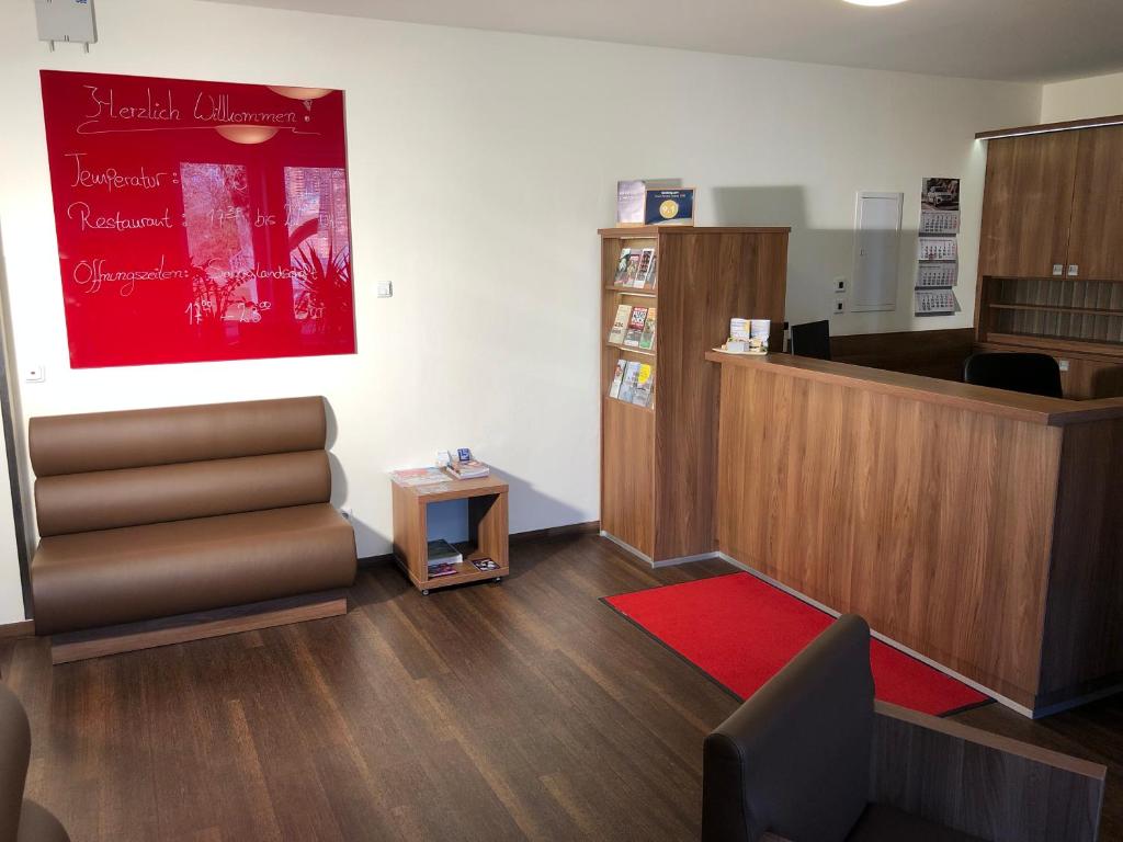 Kuchyň nebo kuchyňský kout v ubytování Hotel Isenbütteler Hof