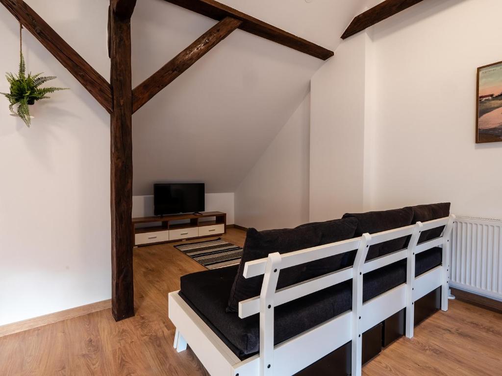 Televízia a/alebo spoločenská miestnosť v ubytovaní EVA Rooms & Studio Apartment