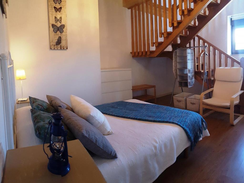 Postel nebo postele na pokoji v ubytování Apartamentos A Palleira