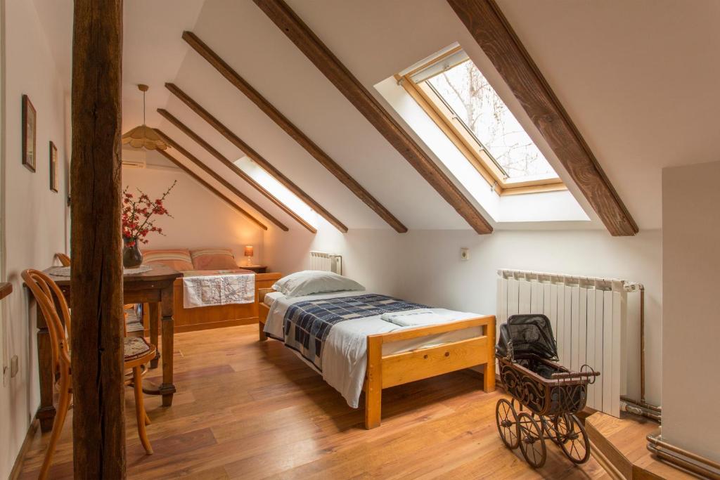 Een bed of bedden in een kamer bij Pension Kezele