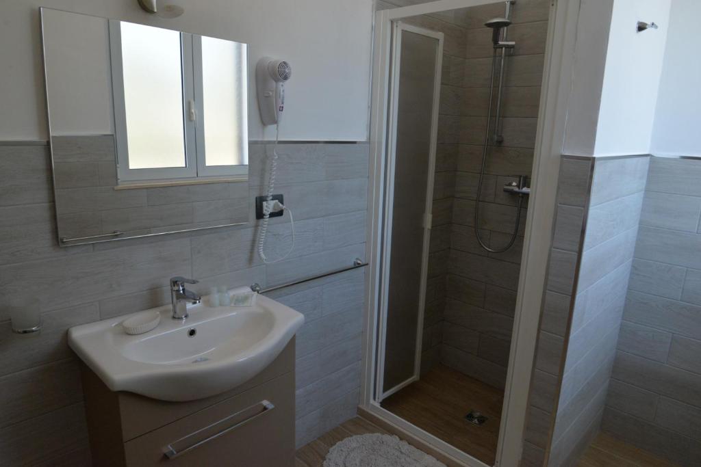 Koupelna v ubytování B&B Lara Santola