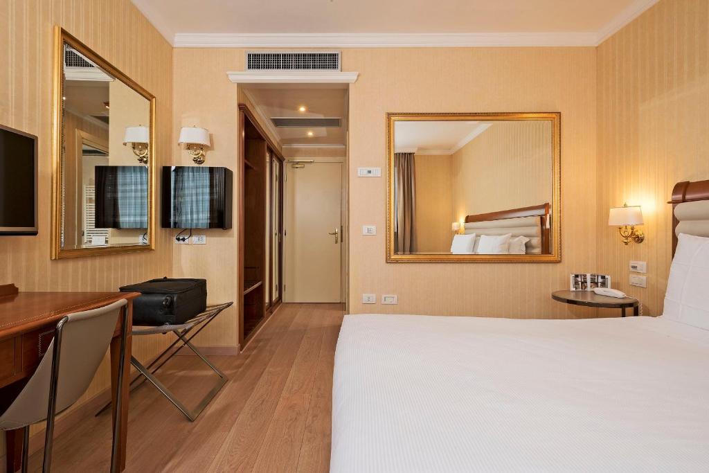 TV a/nebo společenská místnost v ubytování Hotel Maggior Consiglio