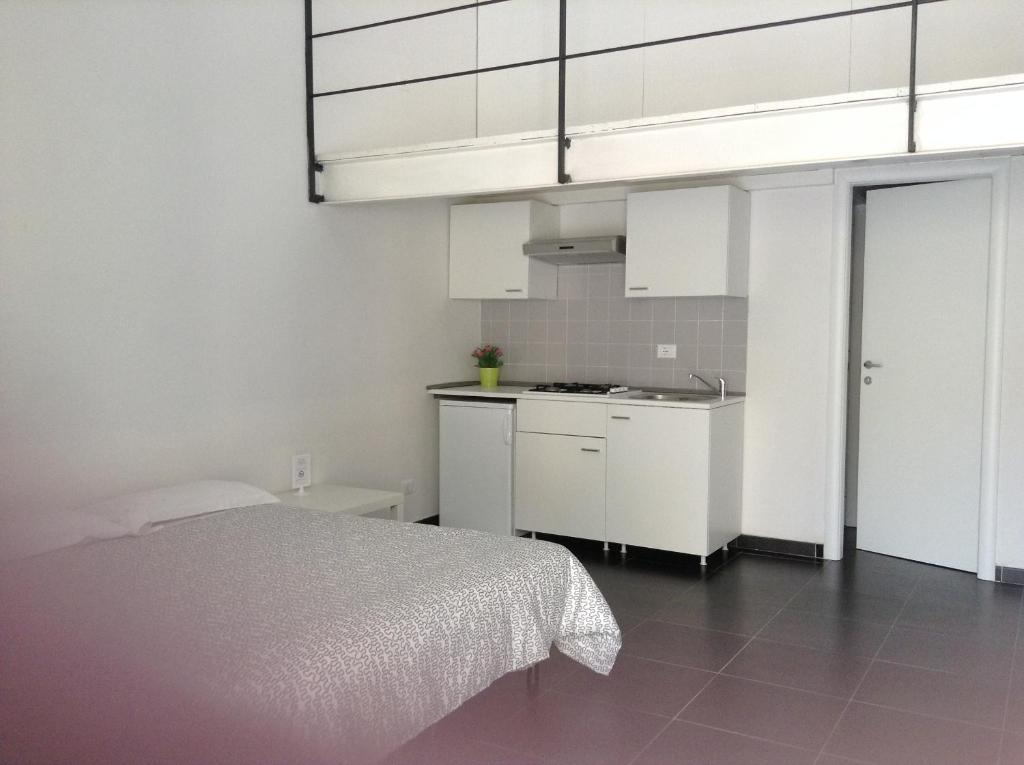 Kuchnia lub aneks kuchenny w obiekcie Loft Regio Parco