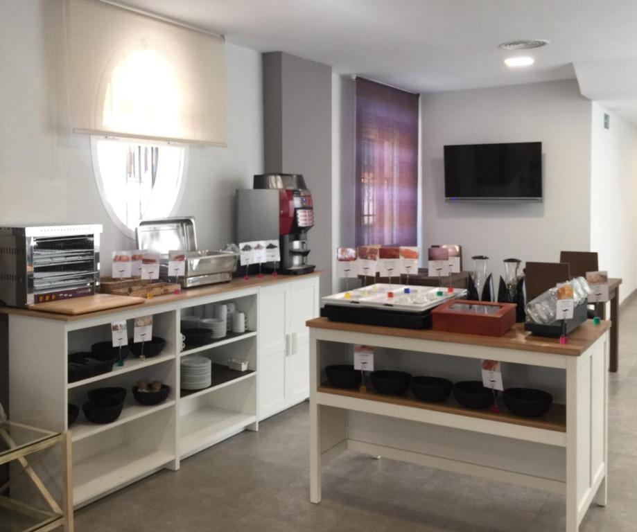 Kuchyňa alebo kuchynka v ubytovaní Itaca Artemisa by Soho Boutique