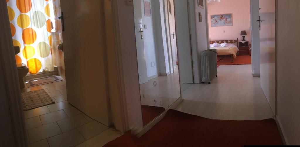 Łóżko lub łóżka w pokoju w obiekcie Chris Studios & Apartments