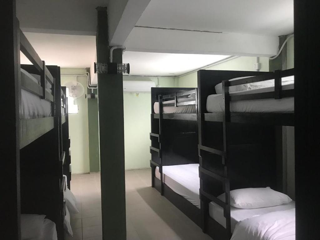 Postel nebo postele na pokoji v ubytování Perhentian Chomel Chalet