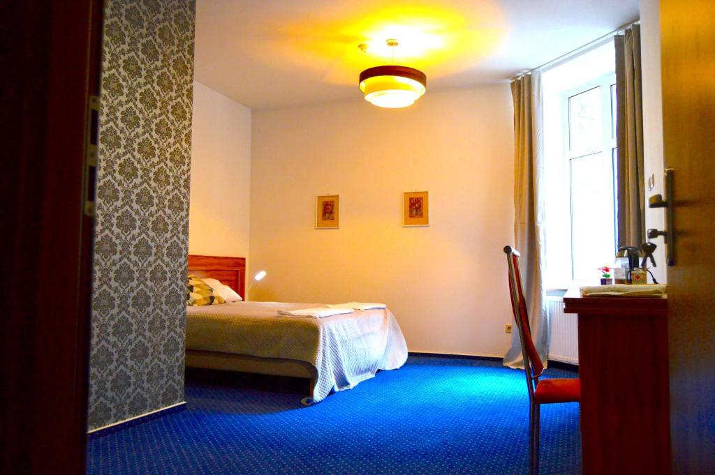 Posteľ alebo postele v izbe v ubytovaní Apartamenty Next to Galeria Katowice