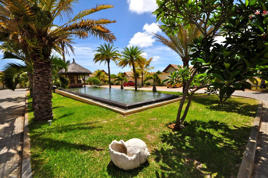 Zahrada ubytování Oasis Villas by Fine & Country