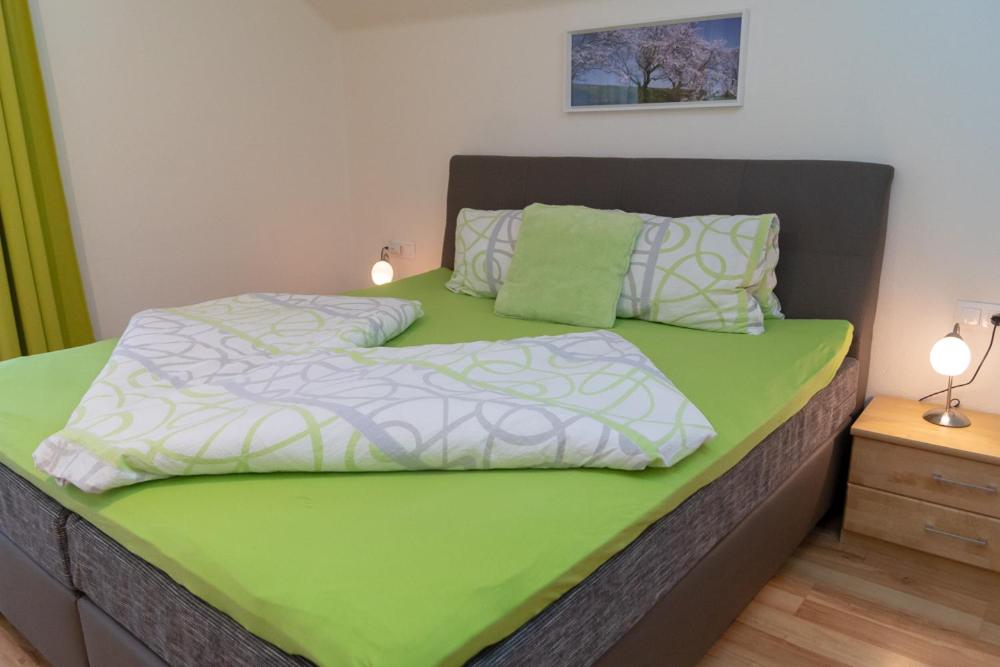 Postel nebo postele na pokoji v ubytování Appartementhaus Monika