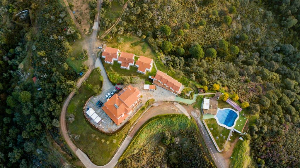 an aerial view of a house with a yard at Complejo Los Veneros in Santa Ana la Real