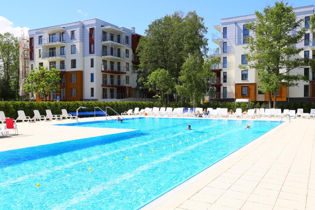 Bazén v ubytovaní KOLOBRZEG apartamenty GREG POLANKI alebo v jeho blízkosti