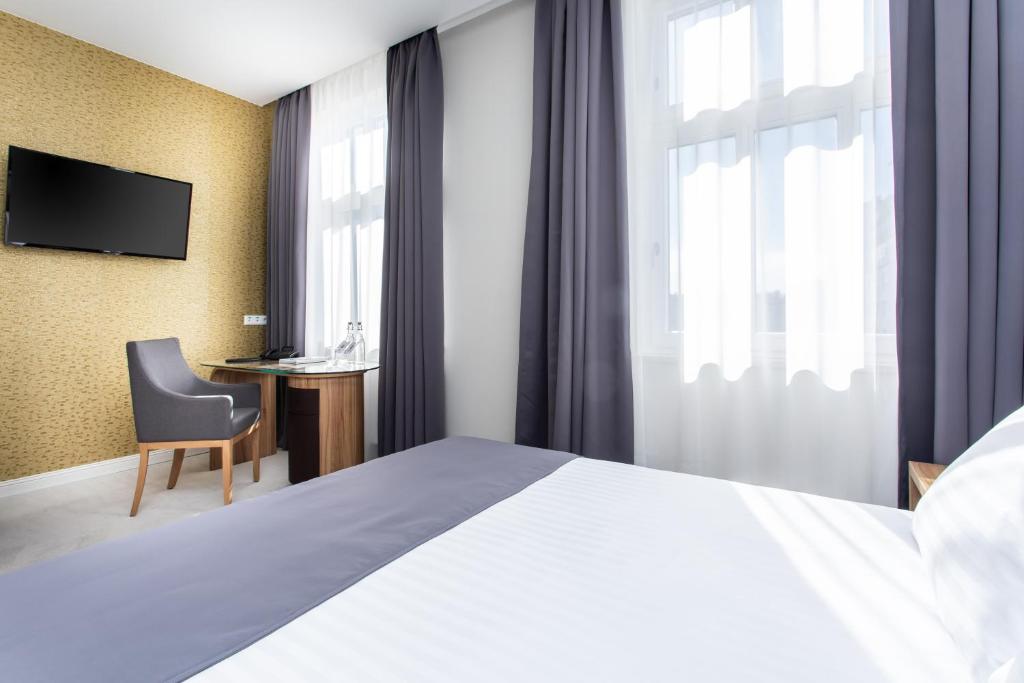 TV a/nebo společenská místnost v ubytování Jakubowy Hotel