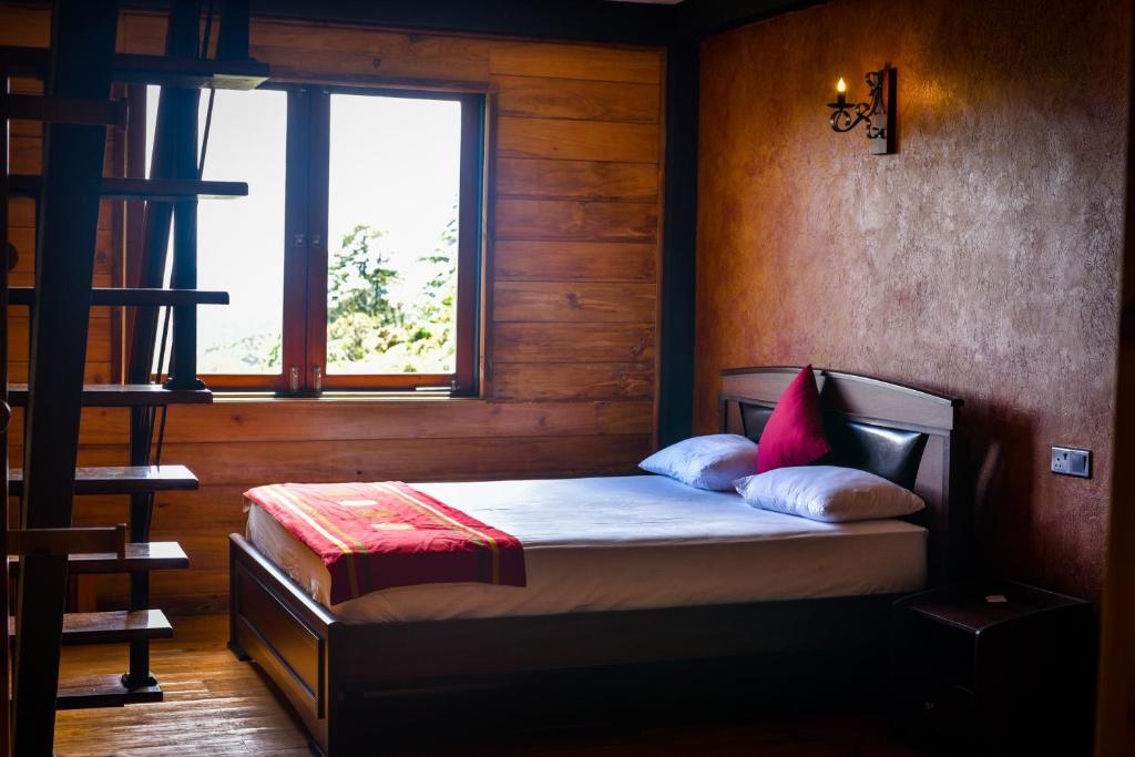Postel nebo postele na pokoji v ubytování Amansara Bungalow
