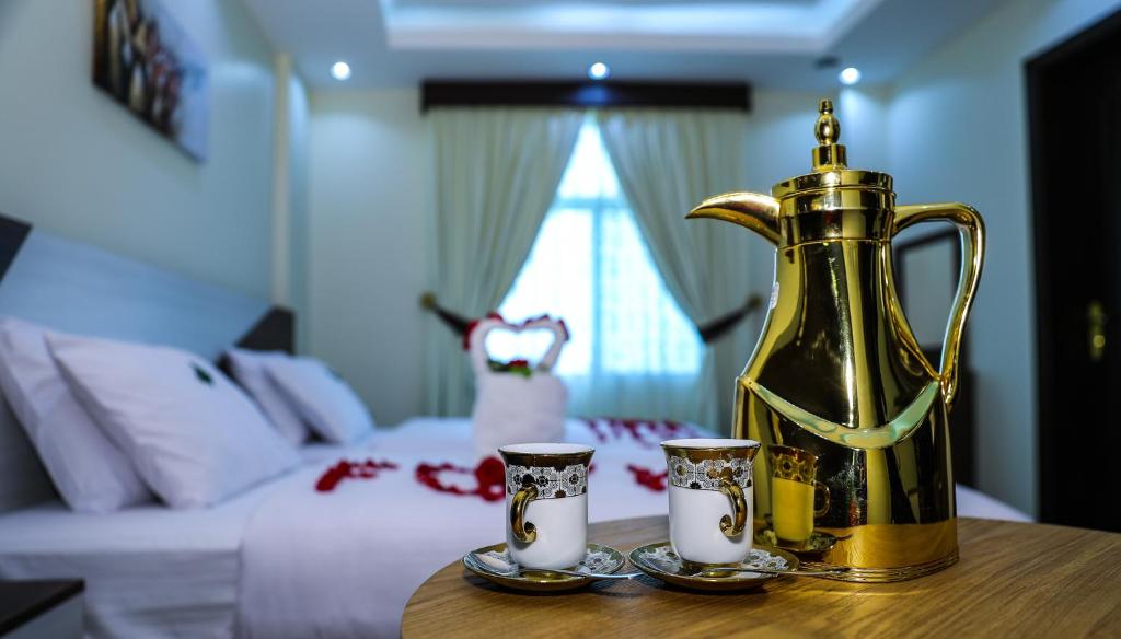 Postel nebo postele na pokoji v ubytování F & H Hotel