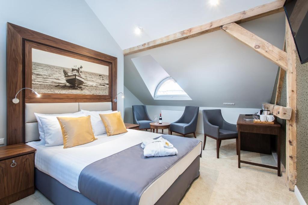 Postel nebo postele na pokoji v ubytování Jakubowy Hotel